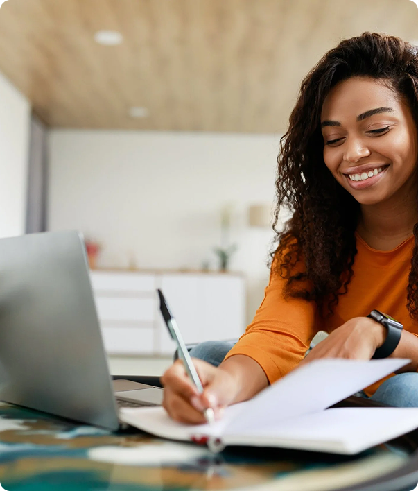 Woman writing in notebook