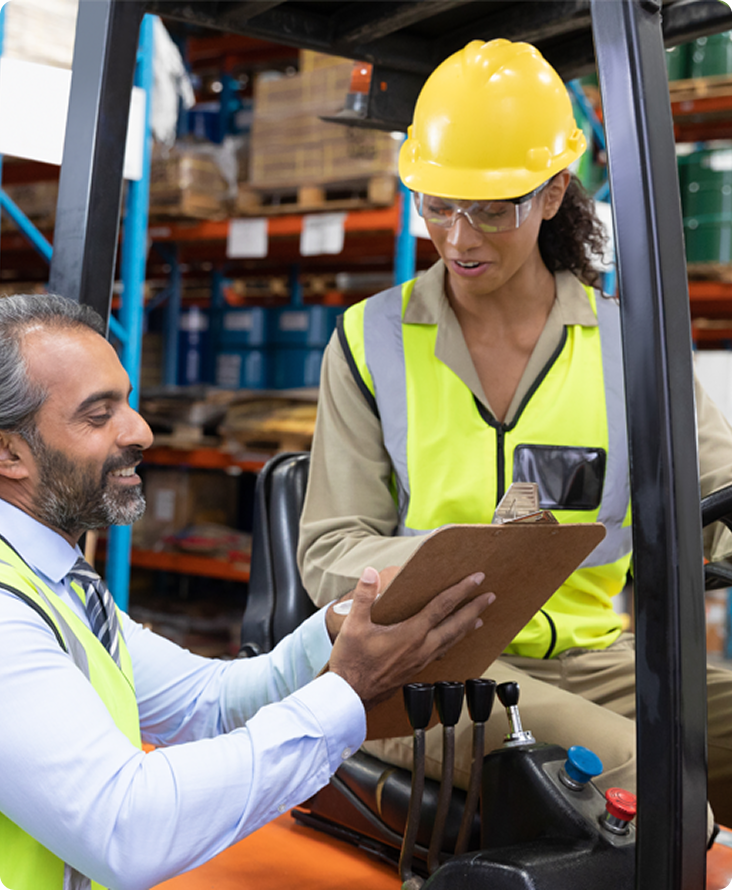 Warehouse team with tablet and boxes